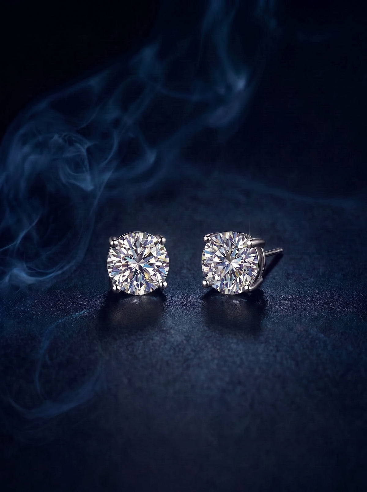 Blaise studs, a pair of large solitaire stud earrings in a four-prong setting.