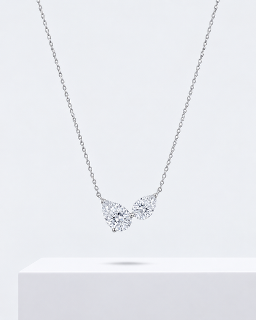Adrienne halo pendant, a teardrop pear halo necklace on a fine chain.