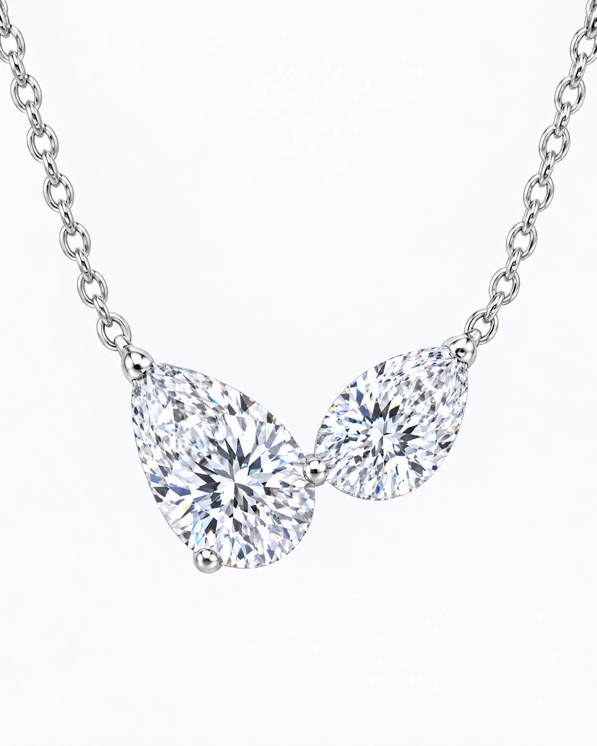 Close-up of the Adrienne halo pendant's stones and halo.