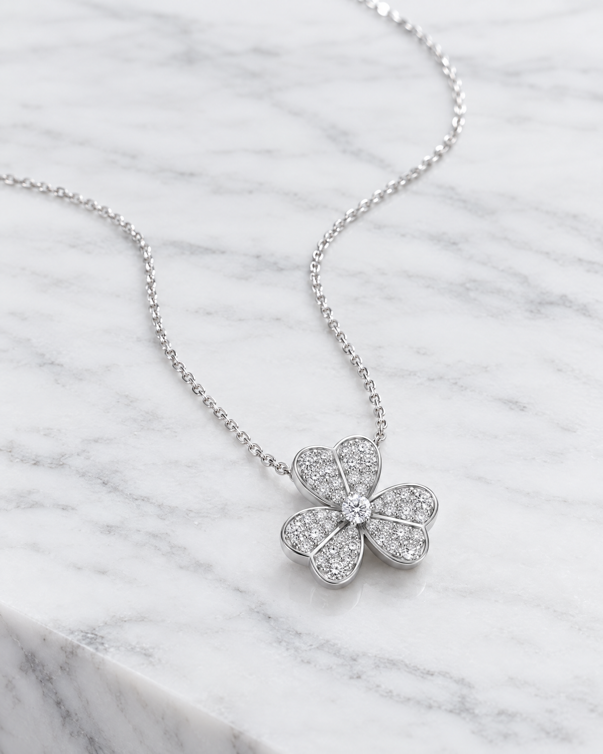 Odette clover pendant from an angle.
