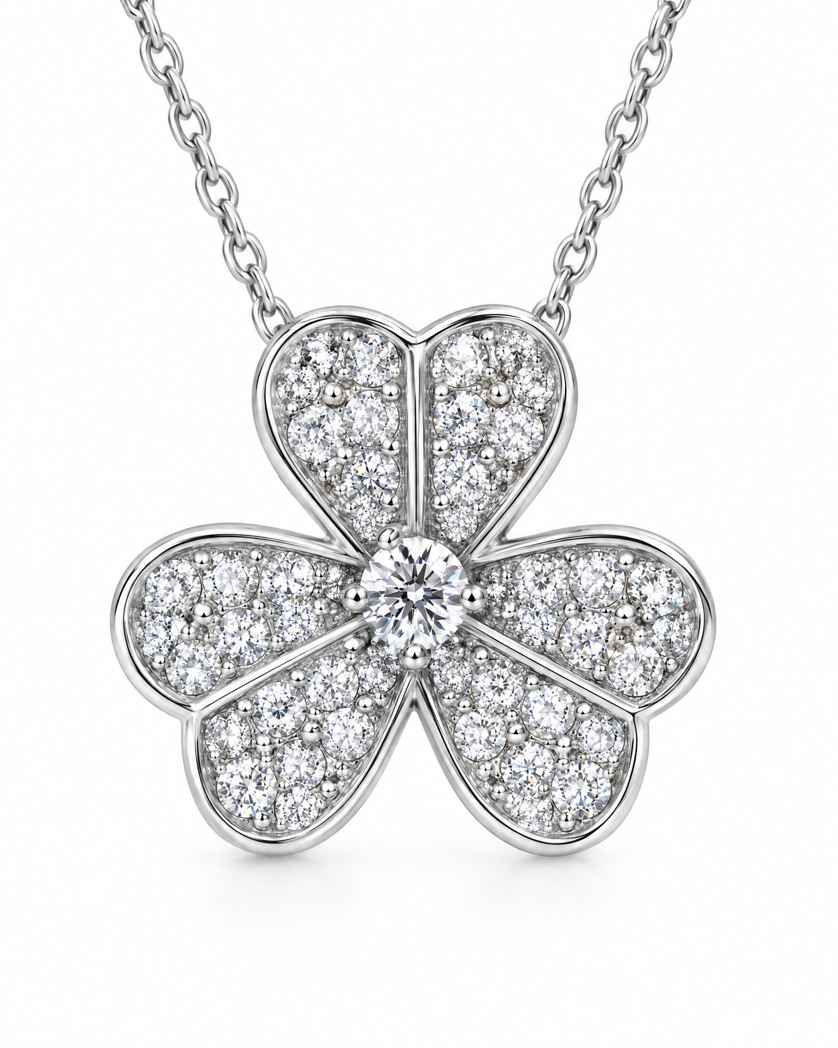 Close-up of the Odette clover pendant's stone-set leaves.