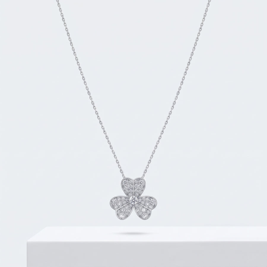 Odette clover pendant, a clover pendant necklace set with stones, on a fine cable chain.